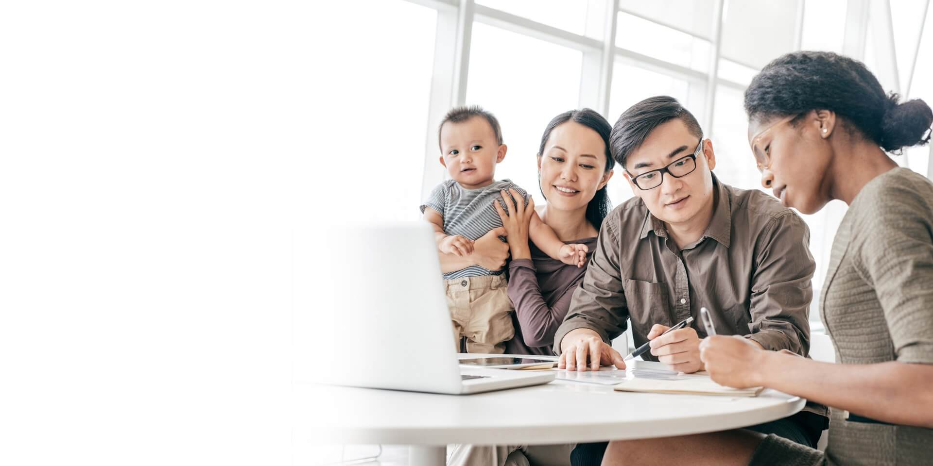 A banker helping a family look at their financial potential