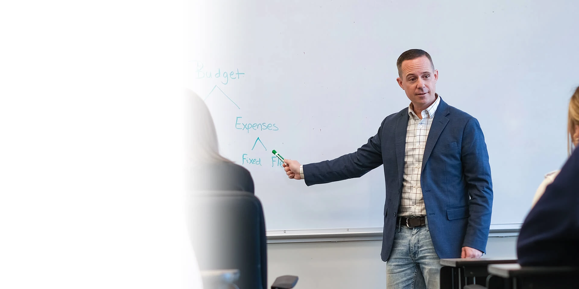 An associates conducting a financial education class